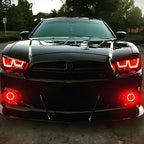 Front view of Dodge Charger with aftermarket red multicolor headlights and halos