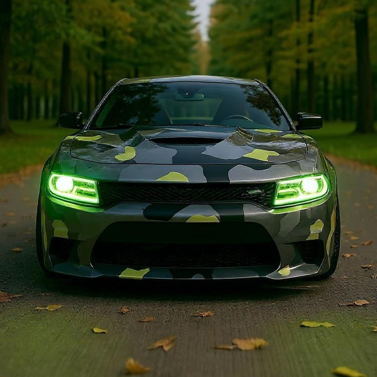 Custom Dodge Charger with multicolor projector headlights in green at forest road
