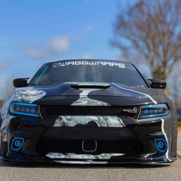 Lowered Dodge Charger with RGBW headlights and fog lights glowing blue